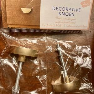 Decorative knobs. Gold semicircle hardware. Includes 2 knobs, 2 nuts, 2 washers.